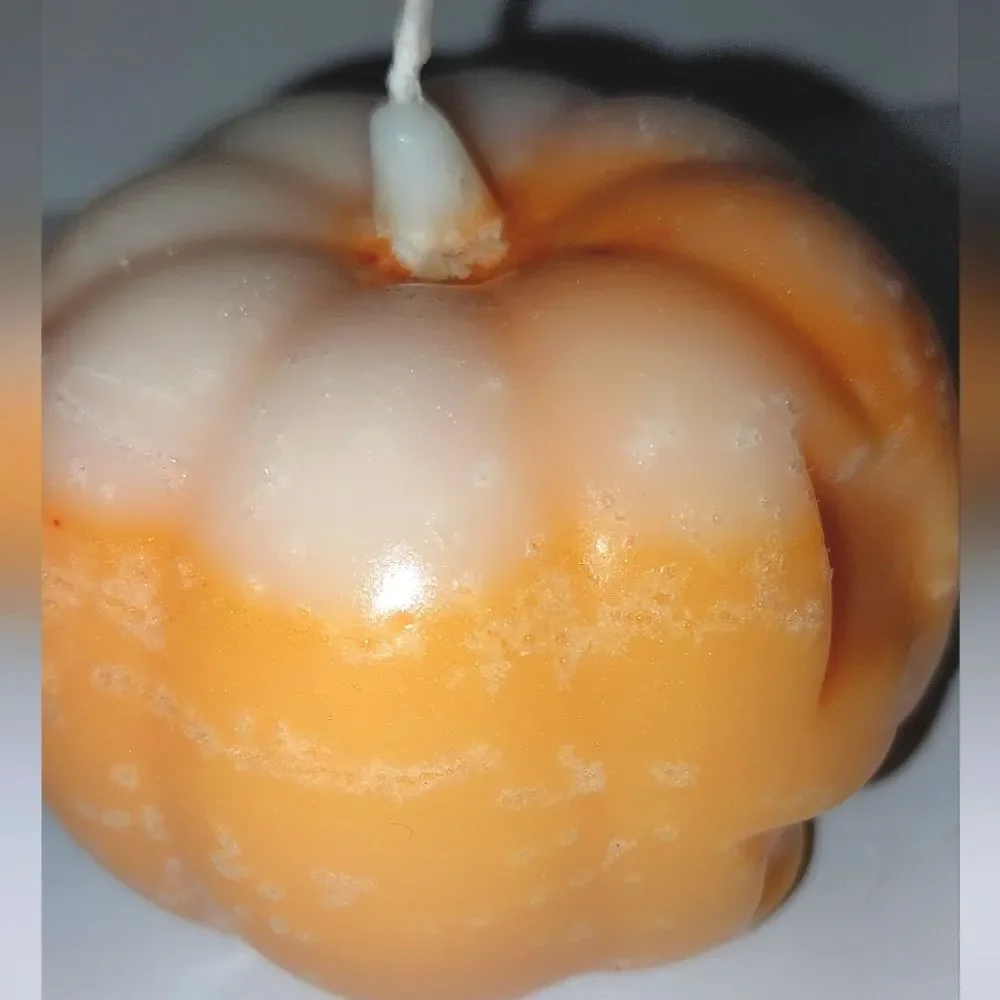 Hand crafted limited edition pumpkin candle from our spooky candle collection
